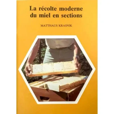 La récolte moderne du miel en sections