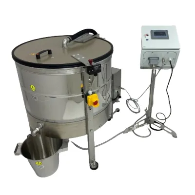 Intérieur de la chaudière centrifuge Fritz avec paniers et supports de cadres Intérieur de la chaudière centrifuge Fritz avec paniers et supports de cadres